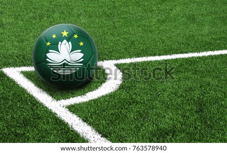 The flag of Macau is depicted on a football, with a good place for your text