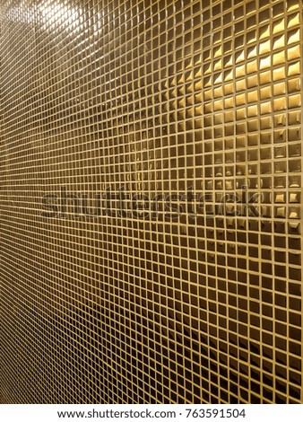 Gold mosaic tile wall 