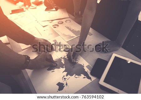 businessman discussing  strategy and planning  project to investment in overseas Branches Royalty-Free Stock Photo #763594102