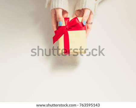 celebration idea for christmas and new year event by beauty woman hand hold the gift box for offer to her respect person with isolated white background