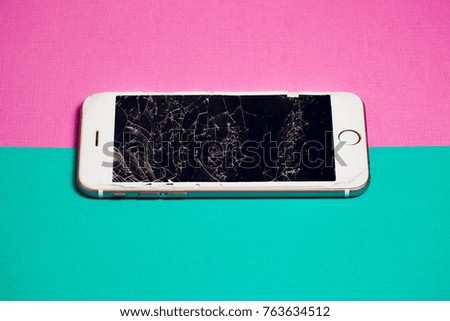 Modern mobile smartphone with broken screen color