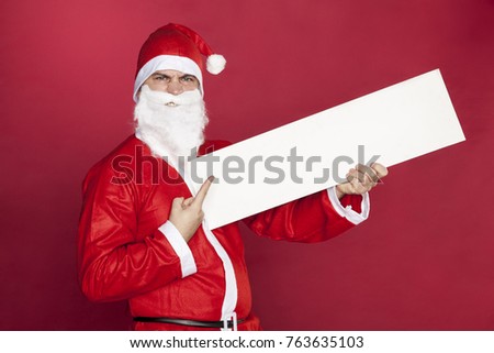 Santa Claus shows on the ad in the hand