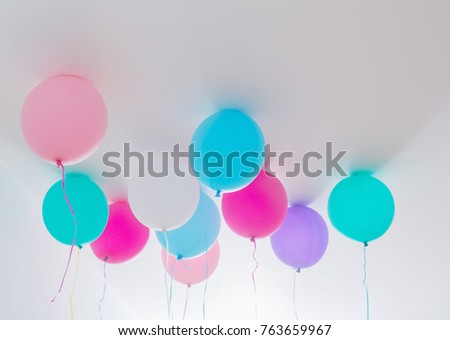balloons on white wooden background