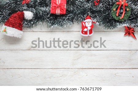 Table top view image of decorations & ornaments Merry Christmas background concept.essential Items on vintage rustic white table at home office desk.free space for creative design text and detail.
