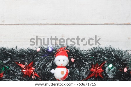 Table top view image of decorations Merry Christmas & Happy New Year background concept.Many accessories items and ornaments decor seasonal on modern rustic white wooden at home office desk studio.