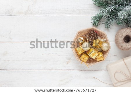 Table top view aerial image of accessories to travel on Merry Christmas & Happy New Year trip background concept.All object on modern rustic white wooden at home office desk studio.Free space for text