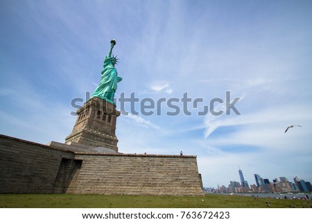 Statue of Liberty and Manhattan in perspective wide angle