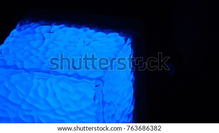 Colorful defocused light back. Blue light background.
