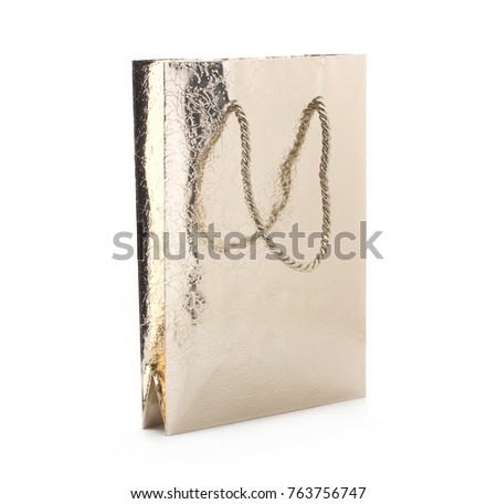 Gold gift package on white background