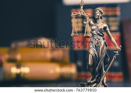 The Statue of Justice - lady justice or Iustitia / Justitia the Roman goddess of Justice in lawyer office Royalty-Free Stock Photo #763779850