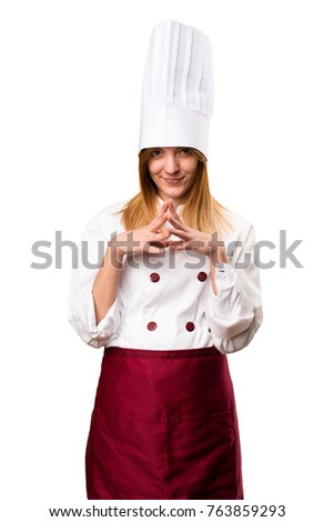Beautiful chef woman thinking