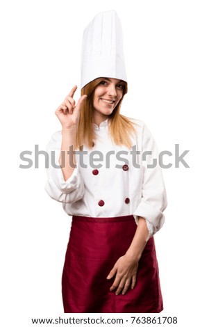 Beautiful chef woman making tiny sign