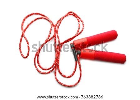 Jumping rope on white background Royalty-Free Stock Photo #763882786