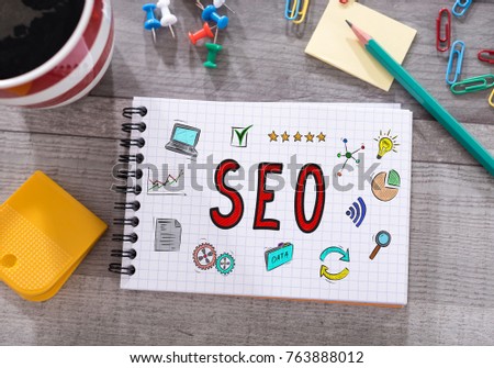 Seo concept drawn on a notepad placed on a desk