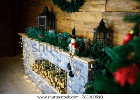 Christmas decorations on pine tree. Low light image.
