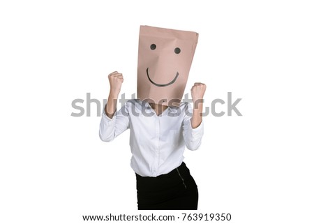 Portrait of unknown businesswoman expressing her success with a paper bag on her head, isolated on white background