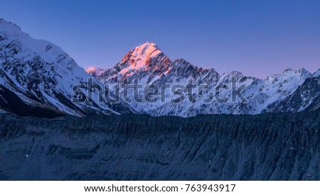 Clear winter sunset view of Aoraki Mount Cook snow covered peak from Kea Point Track in Aoraki Mount Cook National Park, in South Island, New Zealand