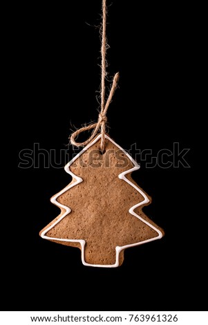 Christmas gingerbread cookies on a black background. Christmas and New Year concept