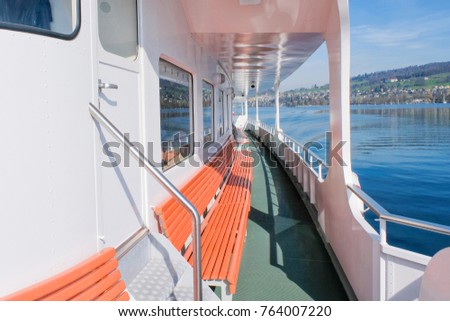 The outside deck of a ferry on lake Lucerne
