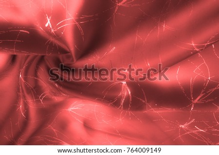 Background texture, pattern. Silk fabric is red with a pattern. Add an exotic flash to your look with this Persian red abstract printed font SIlk Charmeuse. Bold in warm colors