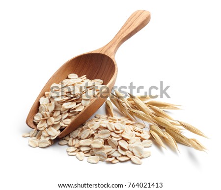scoop and pile of oatmeal with its plant Royalty-Free Stock Photo #764021413