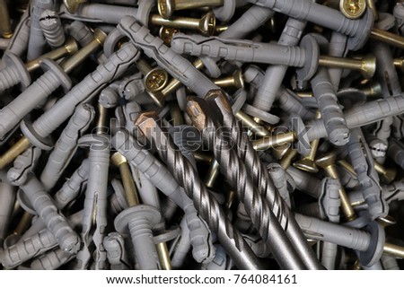 Screws with wall plugs. Dowel. Wall anchors.
