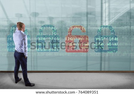 View of a Businessman in front of a wall with Cyber attack concept on a technology interface 