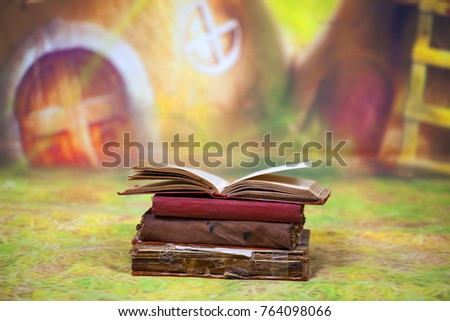 Fairy background with old books