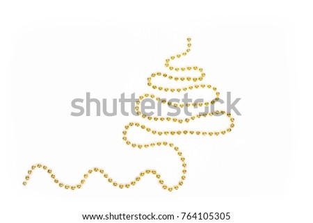 Christmas tree made from golden garland on white background