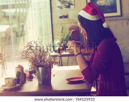 Portrait beautiful Asian woman drinking coffee in coffee shop.