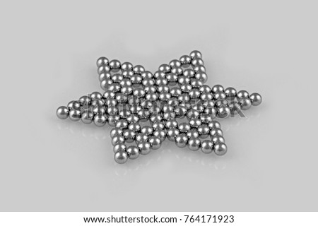 metal balls bearing tiling in perfect six-pointed star grid