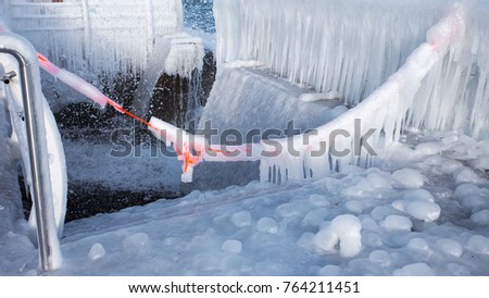 Frozen coast sea in winter. Everything was covered with ice background
