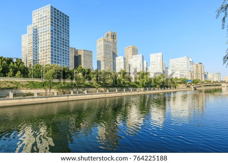 Business district office buildings and water reflection in Beijing 
