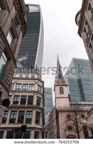 Skyscrapers and historical architecture on one photo. Modern city landscape. View of the mix of modern and historic architecture. London, Great Britain