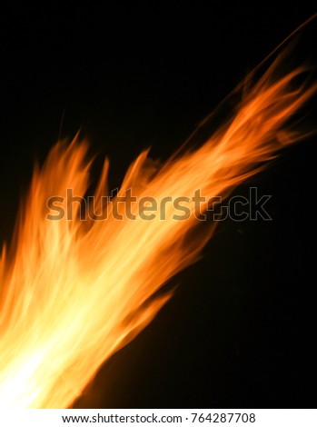 An eruption of flames from a bonfire. This photo was taken in Brisbane, Australia.