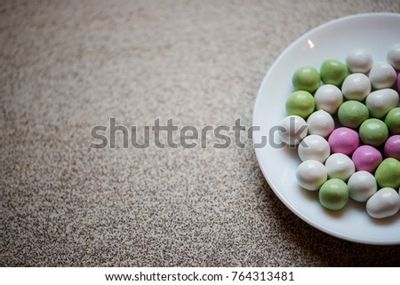 Colorful candy on gray background