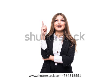 Portrait of young business woman pointing at white