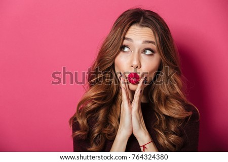 Image of amazing lady standing isolated over pink background. Looking to copyspace.