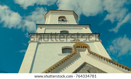Orthodox church in the city of Bar. Prodigal silhouette of an orthodox church against the blue sky. Clouds moving in the background.