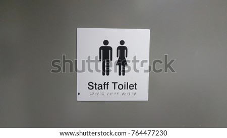 Staff toilet sign with braille