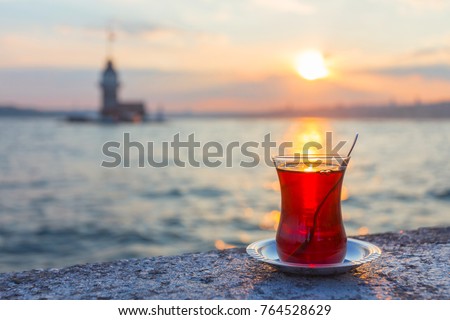 A cup of Turkish tea against the background of the Maiden Tower, Turkey, Istanbul Royalty-Free Stock Photo #764528629