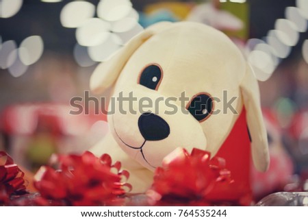 dog doll with gift 