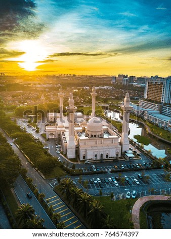 Aerial view of mosque during sunrise.