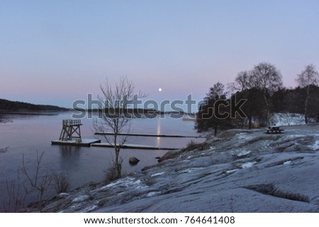 Diving platform in moon shine, lake Malaren, Bromma, Stockholm, Sweden