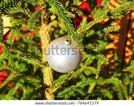 a christmas ball and tree