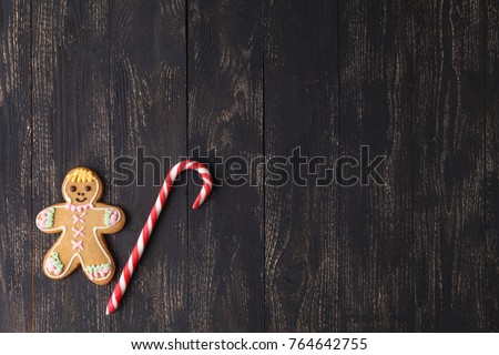 Candy Canes on a Rustic wooden Background