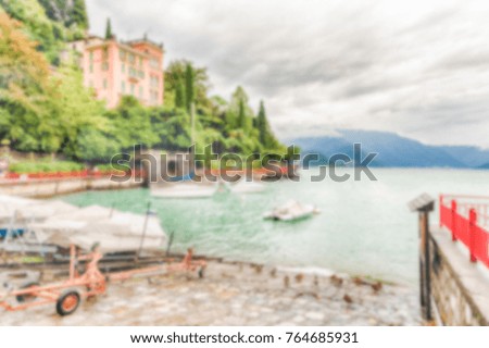 Defocused background of the picturesque village of Varenna over the Lake Como, Italy. Intentionally blurred post production for bokeh effect