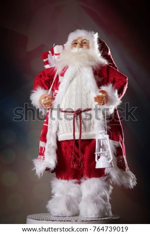 Santa Claus on the dark abstract background