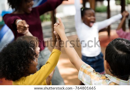 Happy kids at elementary school Royalty-Free Stock Photo #764801665