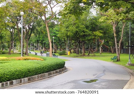 Holidays in Bangkok public park,Family activities,Nature background in Thailand ,Shade and tranquility,Street trees Royalty-Free Stock Photo #764820091